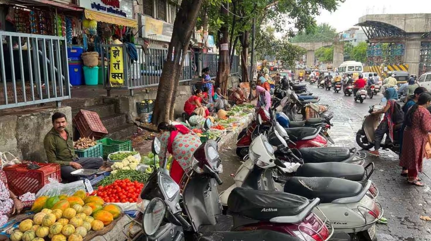 Illegal parking near Law Garden Market narrows the road and causes frequent traf | Soche India